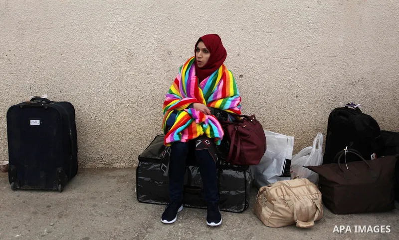 Palestinians wait for travel permits to cross into Egypt through the Rafah border crossing after it was opened by Egyptian authorities for humanitarian cases, in Rafah in the southern Gaza Strip December 17, 2016. Photo...