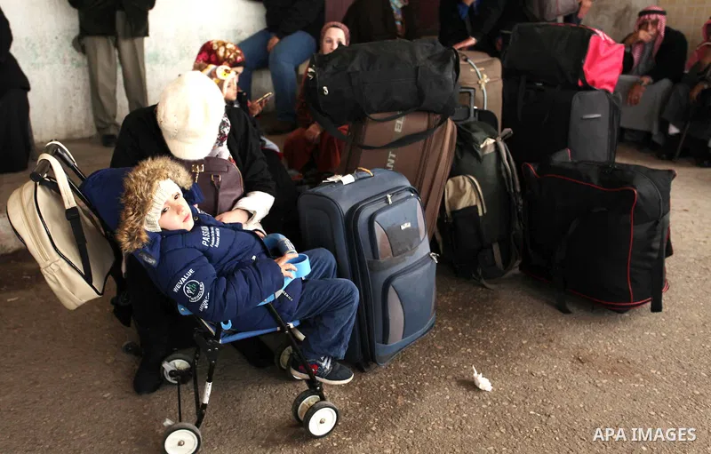 Palestinians wait for travel permits to cross into Egypt through the Rafah border crossing after it was opened by Egyptian authorities for humanitarian cases, in Rafah in the southern Gaza Strip December 17, 2016. Photo...