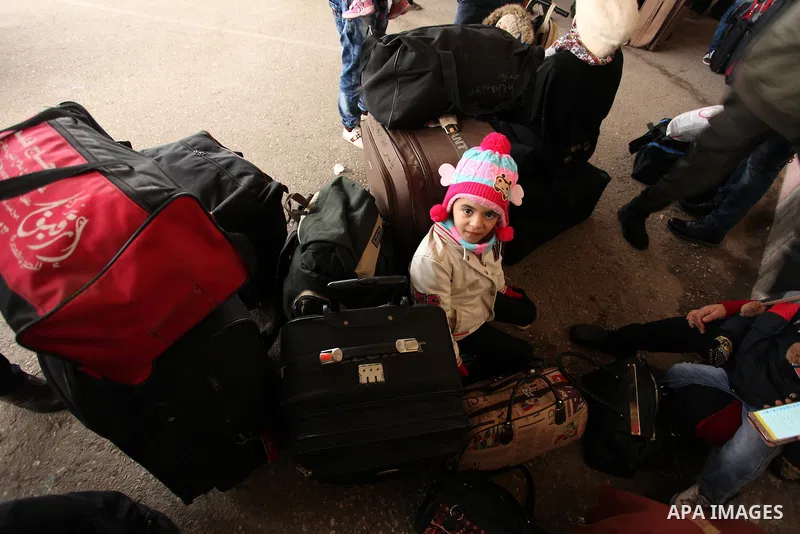 Palestinians wait for travel permits to cross into Egypt through the Rafah border crossing after it was opened by Egyptian authorities for humanitarian cases, in Rafah in the southern Gaza Strip December 17, 2016. Photo...