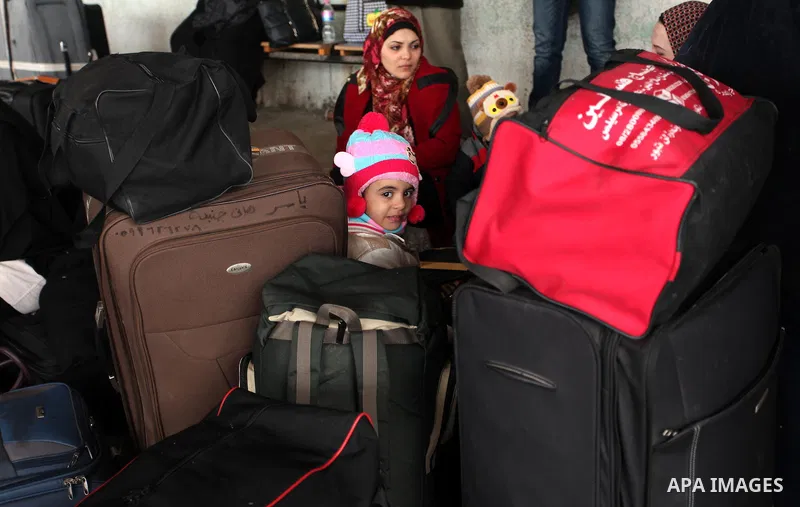 Palestinians wait for travel permits to cross into Egypt through the Rafah border crossing after it was opened by Egyptian authorities for humanitarian cases, in Rafah in the southern Gaza Strip December 17, 2016. Photo...