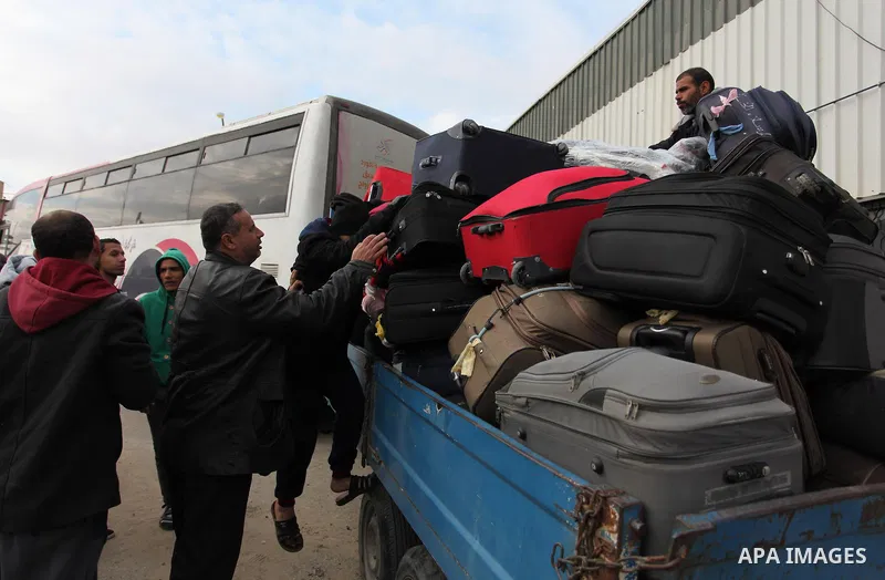 Palestinians wait for travel permits to cross into Egypt through the Rafah border crossing after it was opened by Egyptian authorities for humanitarian cases, in Rafah in the southern Gaza Strip December 17, 2016. Photo...