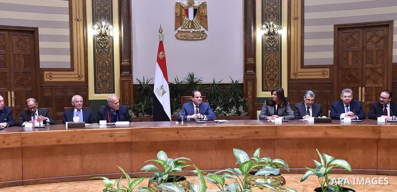 Egyptian President Abdel Fattah al-Sisi, meets with the delegation from Egypt Scholars Abroad, in Cairo, Egypt, on December 17, 2016. Photo by Egyptian President Office