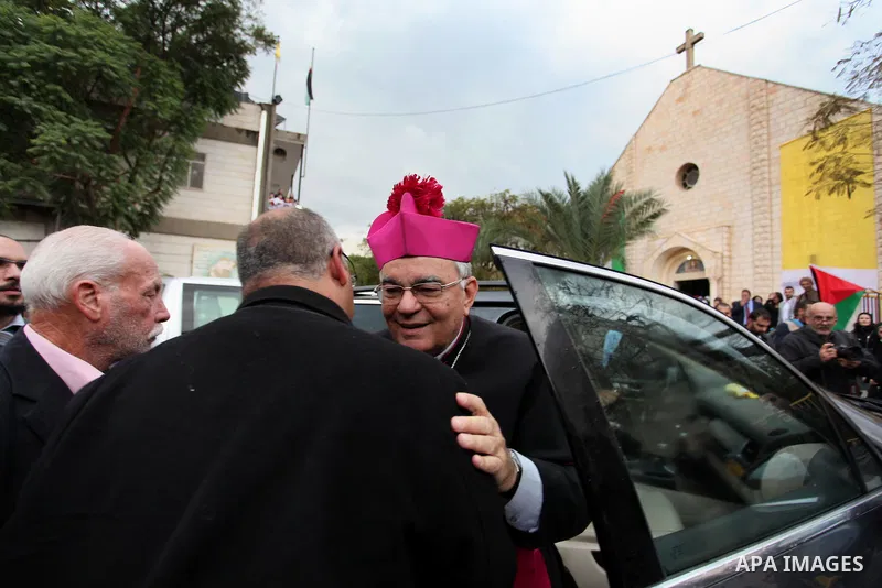 English cardinal Vincent Nichols, Archbishop of Westminster, leads a Sunday mass at Der Latin church in Gaza City on December 18, 2016. Photo by Ashraf Amra