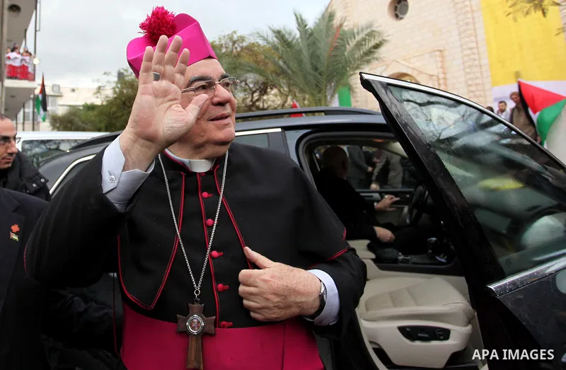 English cardinal Vincent Nichols, Archbishop of Westminster, leads a Sunday mass at Der Latin church in Gaza City on December 18, 2016. Photo by Ashraf Amra