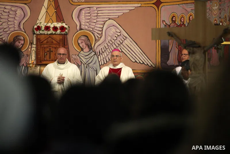 English cardinal Vincent Nichols, Archbishop of Westminster, leads a Sunday mass at Der Latin church in Gaza City on December 18, 2016. Photo by Ashraf Amra