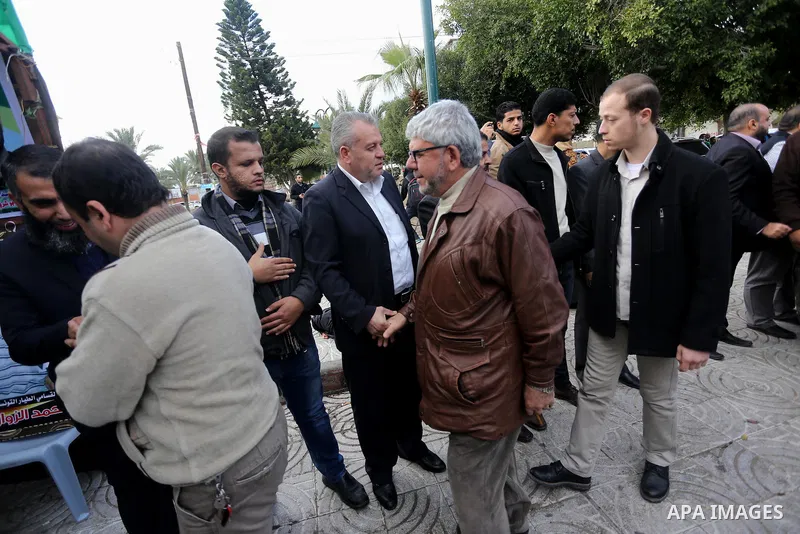 Palestinians take part in mourning tent of a Tunisian Mohammed Zawari, in Gaza city, on December 18, 2016. The Palestinian Hamas movement in Gaza blamed Israel on Saturday for the killing in Tunisia this week of a Tunisi...
