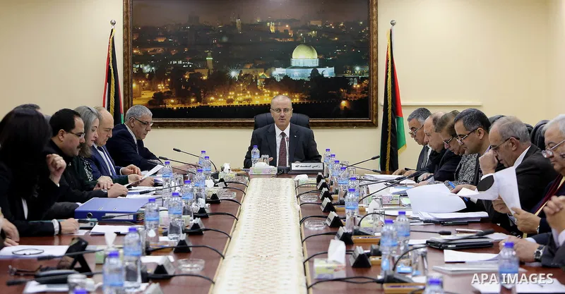 Palestinian Prime Minister, Rami Hamdallah, chairs a meeting of the council Ministers, in the West Bank city of Ramallah, on December 20, 2016. Photo by Prime Minister Office