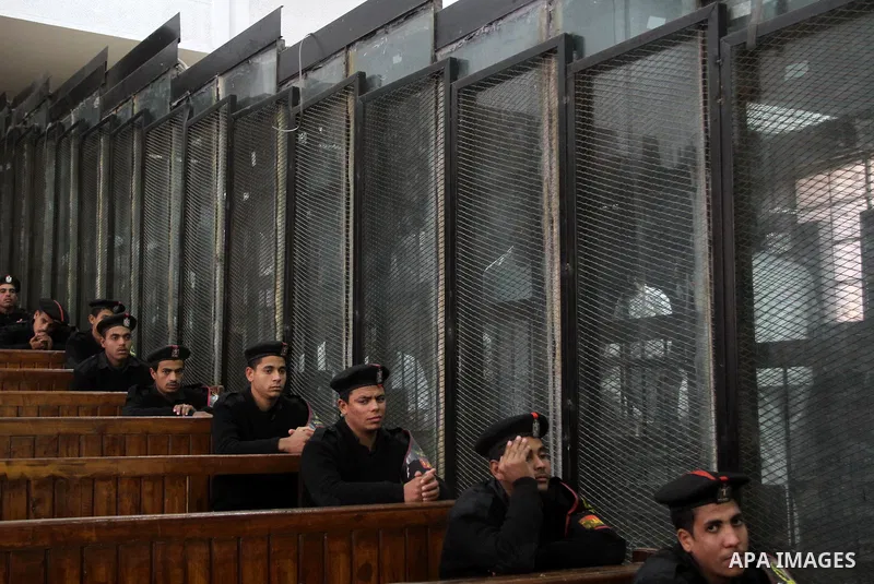 Suspects of Ansar Bait Al-Maqdis group, attend their trial in Cairo on December 20, 2016, on charges of assassination of police officers, attempted assassination of interior minister Mohamed Ibrahim and explosions near s...