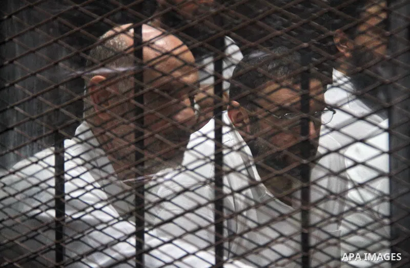 Suspects of Ansar Bait Al-Maqdis group, attend their trial in Cairo on December 20, 2016, on charges of assassination of police officers, attempted assassination of interior minister Mohamed Ibrahim and explosions near s...