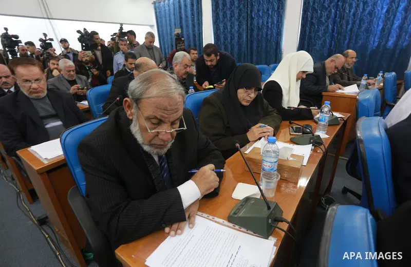 Members of the Palestinian legislative council from Hamas movement attend a meeting at the legislative council in Gaza city, on December 21, 2016. Photo by Mohammed Asad