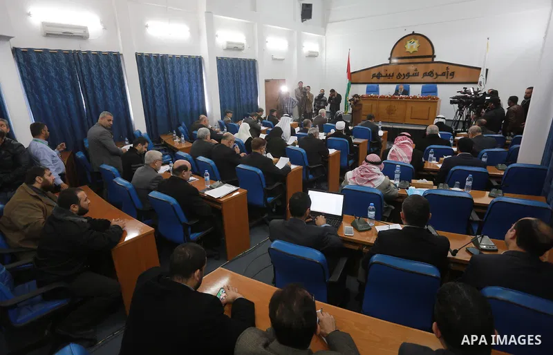 Members of the Palestinian legislative council from Hamas movement attend a meeting at the legislative council in Gaza city, on December 21, 2016. Photo by Mohammed Asad