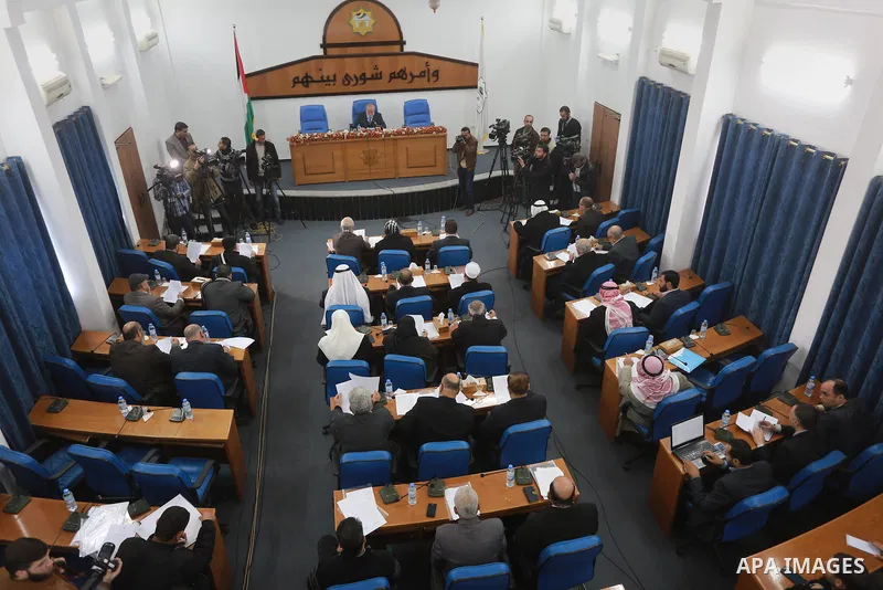 Members of the Palestinian legislative council from Hamas movement attend a meeting at the legislative council in Gaza city, on December 21, 2016. Photo by Mohammed Asad