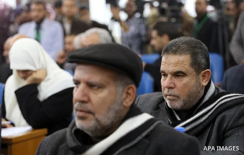 Members of the Palestinian legislative council from Hamas movement attend a meeting at the legislative council in Gaza city, on December 21, 2016. Photo by Mohammed Asad