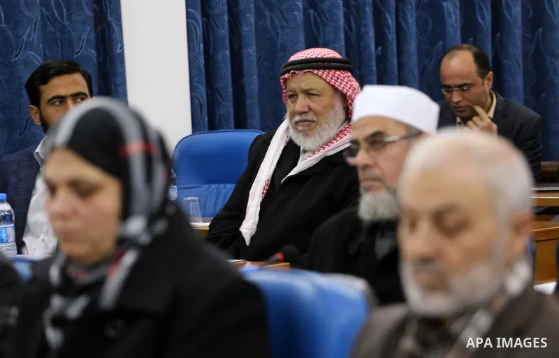 Members of the Palestinian legislative council from Hamas movement attend a meeting at the legislative council in Gaza city, on December 21, 2016. Photo by Mohammed Asad