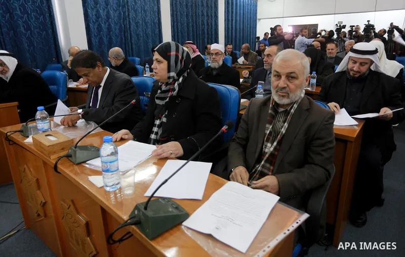 Members of the Palestinian legislative council from Hamas movement attend a meeting at the legislative council in Gaza city, on December 21, 2016. Photo by Mohammed Asad