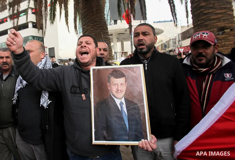 Palestinians take part during a protest to show solidarity with Jordan against terrorist attacks in the West Bank city of Nablus, on December 21, 2016. Jordanian security forces have arrested a man suspected of funding a...