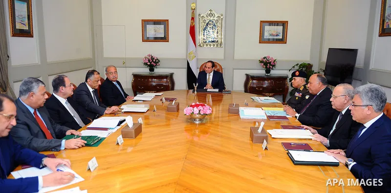 Egyptian President Abdel Fattah al-Sisi chairs a meeting with Egyptian Prime Minister Sharif Ismail and Egyptian officials in Cairo, Egypt, on December 21, 2016. Photo by Egyptian President Office