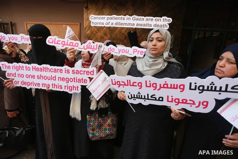 Palestinian Cancer patients take part in a protest to demand to travel for treatment, in Gaza city December 22, 2016. Photo by Mohammed Asad