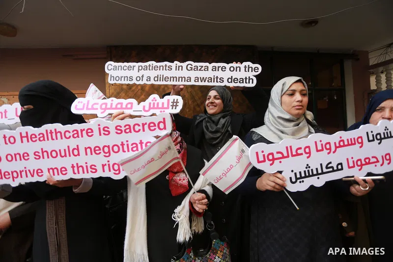 Palestinian Cancer patients take part in a protest to demand to travel for treatment, in Gaza city December 22, 2016. Photo by Mohammed Asad