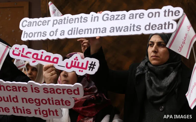 Palestinian Cancer patients take part in a protest to demand to travel for treatment, in Gaza city December 22, 2016. Photo by Mohammed Asad