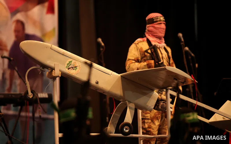 Palestinian members of Ezzedeen al-Qassam, the armed wing of Hamas movement, participate in a memorial service for a Tunisian Mohamed Zaouari, who was murdered in Tunisia in Gaza city on December 26, 2016. Zaouari, 49, w...