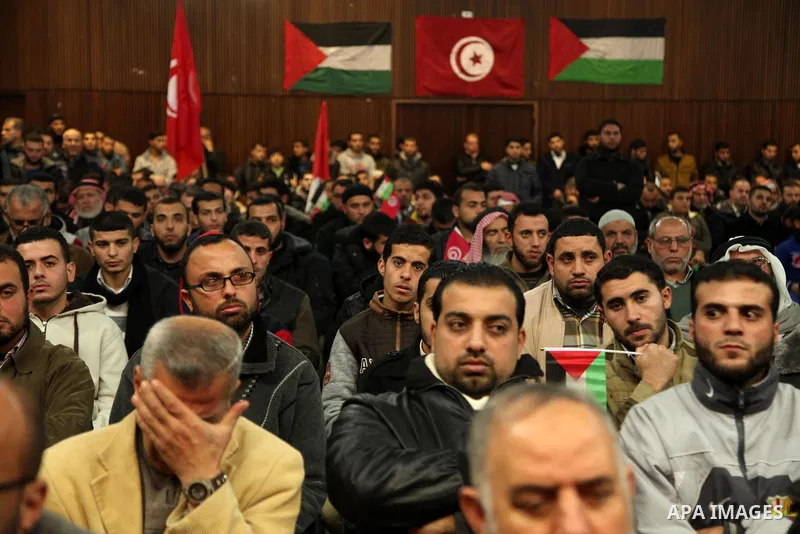 Palestinians attend a memorial service for a Tunisian Mohamed Zaouari, who was murdered in Tunisia in Gaza city on December 26, 2016. Zaouari, 49, was murdered at the wheel of his car outside his house in Tunisia's secon...