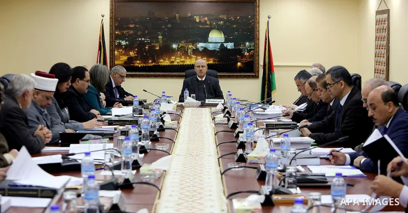 Palestinian Prime Minister, Rami Hamdallah, chairs a meeting of the council Ministers, in the West Bank city of Ramallah, on December 27, 2016. Photo by Prime Minister Office