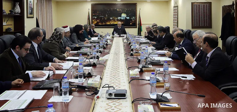 Palestinian Prime Minister, Rami Hamdallah, chairs a meeting of the council Ministers, in the West Bank city of Ramallah, on December 27, 2016. Photo by Prime Minister Office