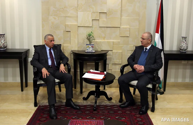 Palestinian Prime Minister, Rami Hamdallah, meets with Head of the Supreme Judicial Council, Imad Salimm in the West Bank city of Ramallah, on December 28, 2016. Photo by Prime Minister Office