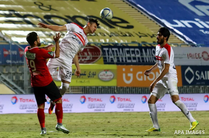 Al-Ahly players compete with Zamalek players during their Egyptian Premier League football match at the Petro Sport stadium in Cairo on December 29, 2016. Photo by Amr Sayed