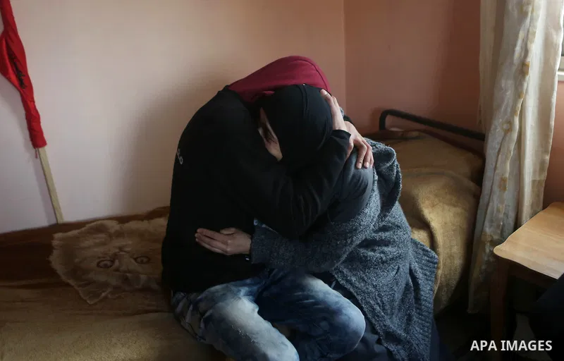 Relatives of Palestinian Maen Nasser al-Din Abu Qaraa, 23, mourn during his funeral after Israel released his body, in the West Bank city of Ramallah, on December 31, 2016. Abu Qaraa was killed by Israeli forces on Nov....