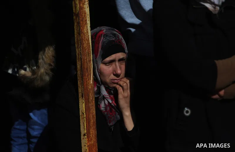 Relatives of Palestinian Maen Nasser al-Din Abu Qaraa, 23, mourn during his funeral after Israel released his body, in the West Bank city of Ramallah, on December 31, 2016. Abu Qaraa was killed by Israeli forces on Nov....