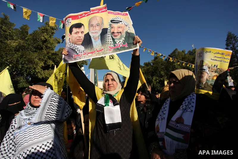 Supporters of Mohammed Dahlan, an exiled rival to the Palestinian president who was recently sentenced in absentia to three years in prison on corruption charges, clash with supporters of Mahmud Abbas during a rally in G...