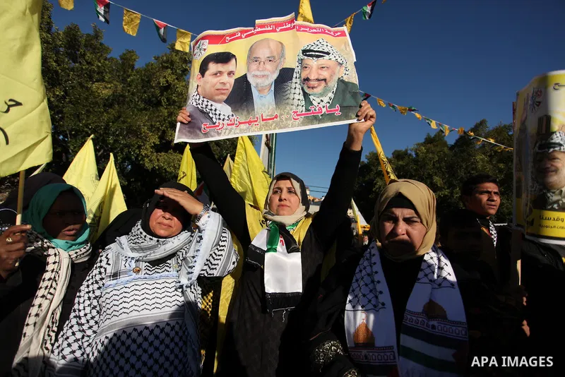 Supporters of Mohammed Dahlan, an exiled rival to the Palestinian president who was recently sentenced in absentia to three years in prison on corruption charges, clash with supporters of Mahmud Abbas during a rally in G...