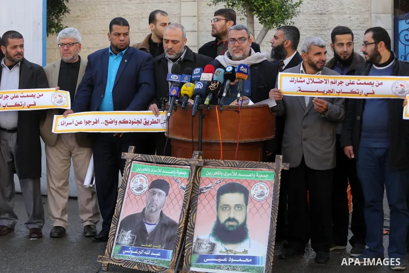Palestinians take part during a protest to show solidarity with prisoners held in Israeli Jails, in front of the high commissioner for human rights headquarters, on January 3, 2017. Photo by Mohammed Asad