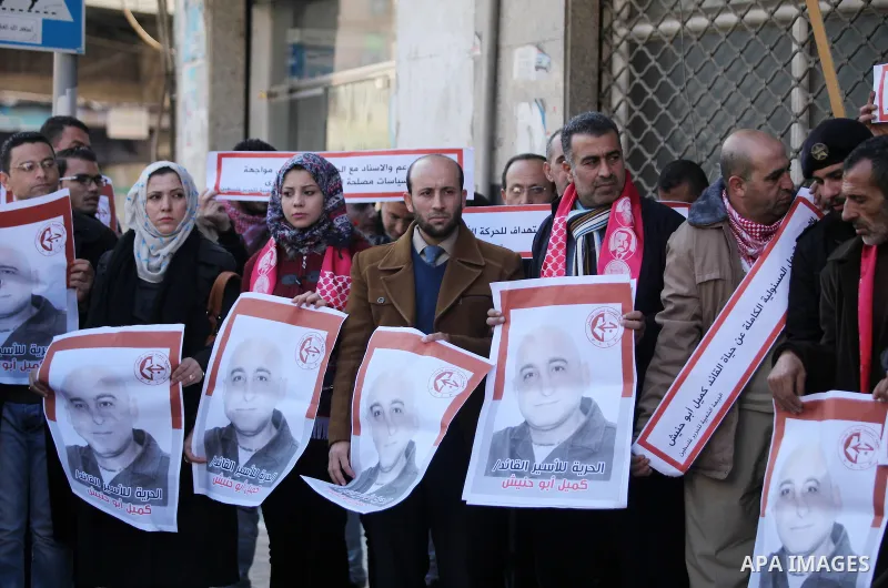 Palestinian supporters of the Popular Front for the Liberation of Palestine (PFLP), take part during a protest to show solidarity with Palestinian prisoners in Israeli jails, in Gaza city on January 4, 2017. Photo by Ash...