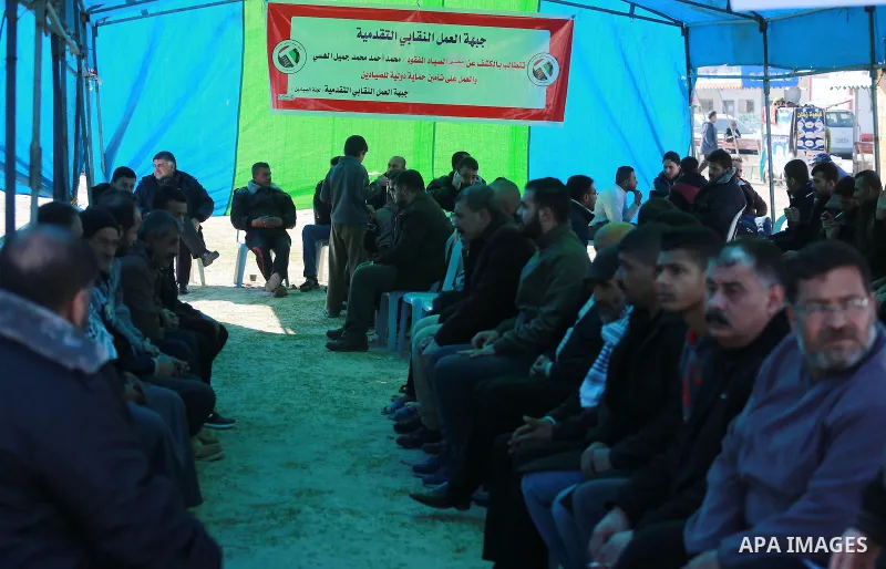 Palestinians take part in a protest to know the fate of a Palestinian fisherman Muhammad Al-Hissi who was missing after Israeli navy ship attacked and sunk a boat belonging to him at the Gaza seaport, on January 6, 2017....