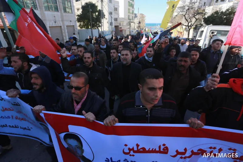 Palestinians take part in a protest to know the fate of a Palestinian fisherman Muhammad Al-Hissi who went missing Wednesday after an encounter with Israeli forces, was announced dead on Friday, in Gaza city, on January...