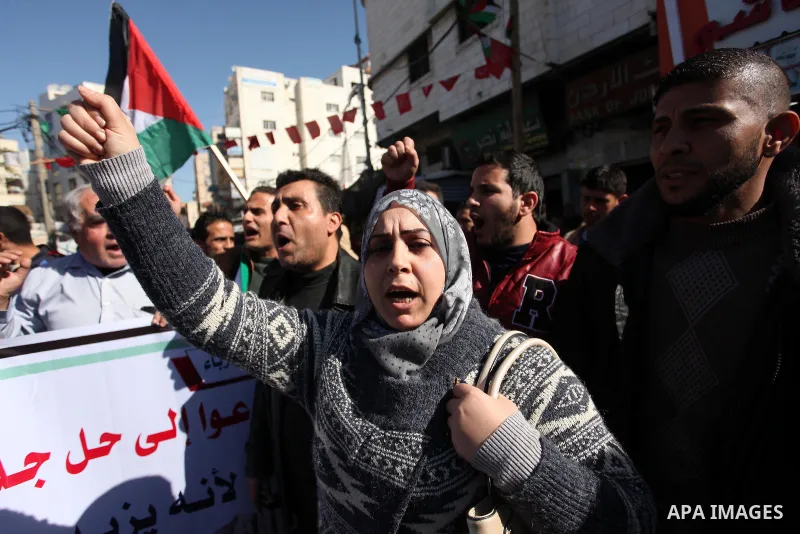 Palestinian supporters of the Democratic Front for the Liberation of Palestine (DFLP) take part in a protest against the ongoing electricity shortages in Gaza City on January 12, 2017. Power shortages in the Palestinian...