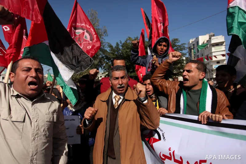 Palestinian supporters of the Democratic Front for the Liberation of Palestine (DFLP) take part in a protest against the ongoing electricity shortages in Gaza City on January 12, 2017. Power shortages in the Palestinian...