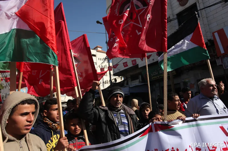Palestinian supporters of the Democratic Front for the Liberation of Palestine (DFLP) take part in a protest against the ongoing electricity shortages in Gaza City on January 12, 2017. Power shortages in the Palestinian...