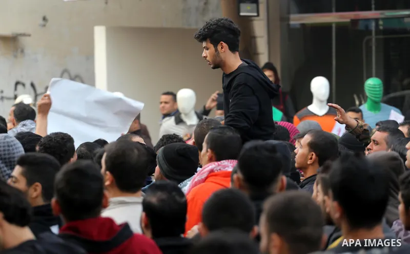 Palestinians take part in a demonstration against the ongoing electricity shortages , in Jabalia in the northern of Gaza Strip, on January 12, 2017. Power shortages in the Palestinian enclave have occurred repeatedly in...