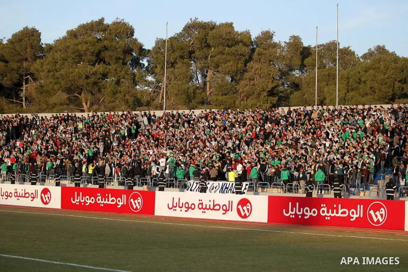 Fans attend a second leg match of Arab championship for clubs between Palestinian players of Shabab Hebron and Players of Lebanese al-Ahed FC at Amman international stadium, in Amman, Jordan, on January 12, 2017. Photo b...