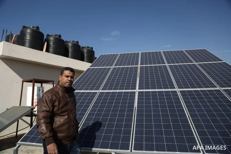 A general view shows solar energy panels at a solar plant in Gaza City on January 12, 2017. A growing number of Gazans fed up with their erratic electricity supply are turning to solar power in an area where the sun shin...