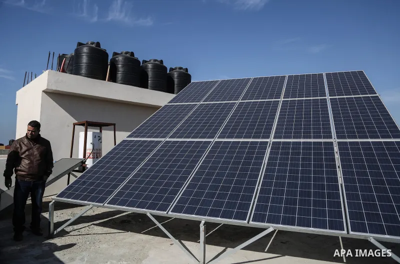 A general view shows solar energy panels at a solar plant in Gaza City on January 12, 2017. A growing number of Gazans fed up with their erratic electricity supply are turning to solar power in an area where the sun shin...
