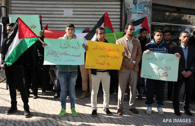 Palestinians take part in a demonstration against the ongoing electricity shortages in Gaza city on January 15, 2017. Power shortages in the Palestinian enclave have occurred repeatedly in recent weeks, with homes in Gaz...