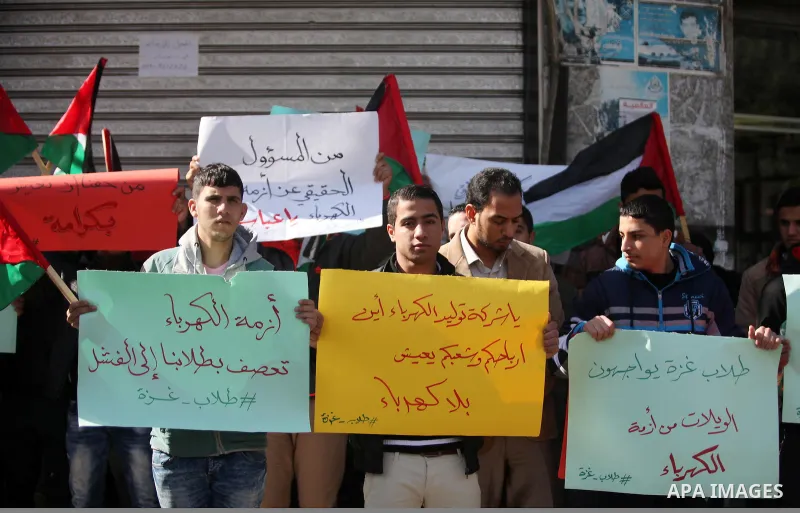 Palestinians take part in a demonstration against the ongoing electricity shortages in Gaza city on January 15, 2017. Power shortages in the Palestinian enclave have occurred repeatedly in recent weeks, with homes in Gaz...