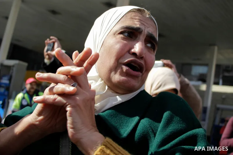 An Egyptian woman celebrates after the Supreme Administrative Court upheld on January 16, 2017 a ruling voiding a government agreement to hand over the two Red Sea islands of Tiran and Sanafir to Saudi Arabia in a deal t...