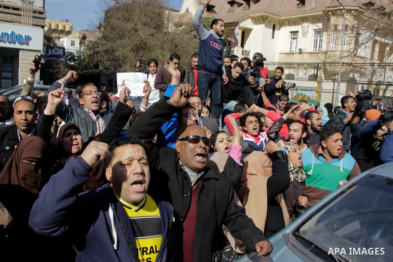 Egyptians celebrate after the Supreme Administrative Court upheld on January 16, 2017 a ruling voiding a government agreement to hand over two Red Sea islands Tiran and Sanafir to Saudi Arabia in a deal that had sparked...