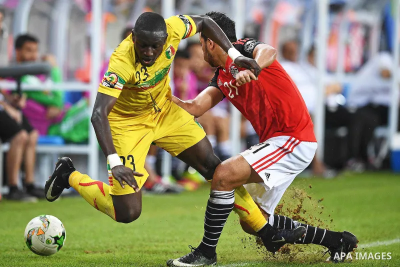 Egypt's Players compete with Malian players during the 2017 Africa Cup of Nations group D football match between Mali and Egypt in Port-Gentil on January 17, 2017. Photo by Stranger